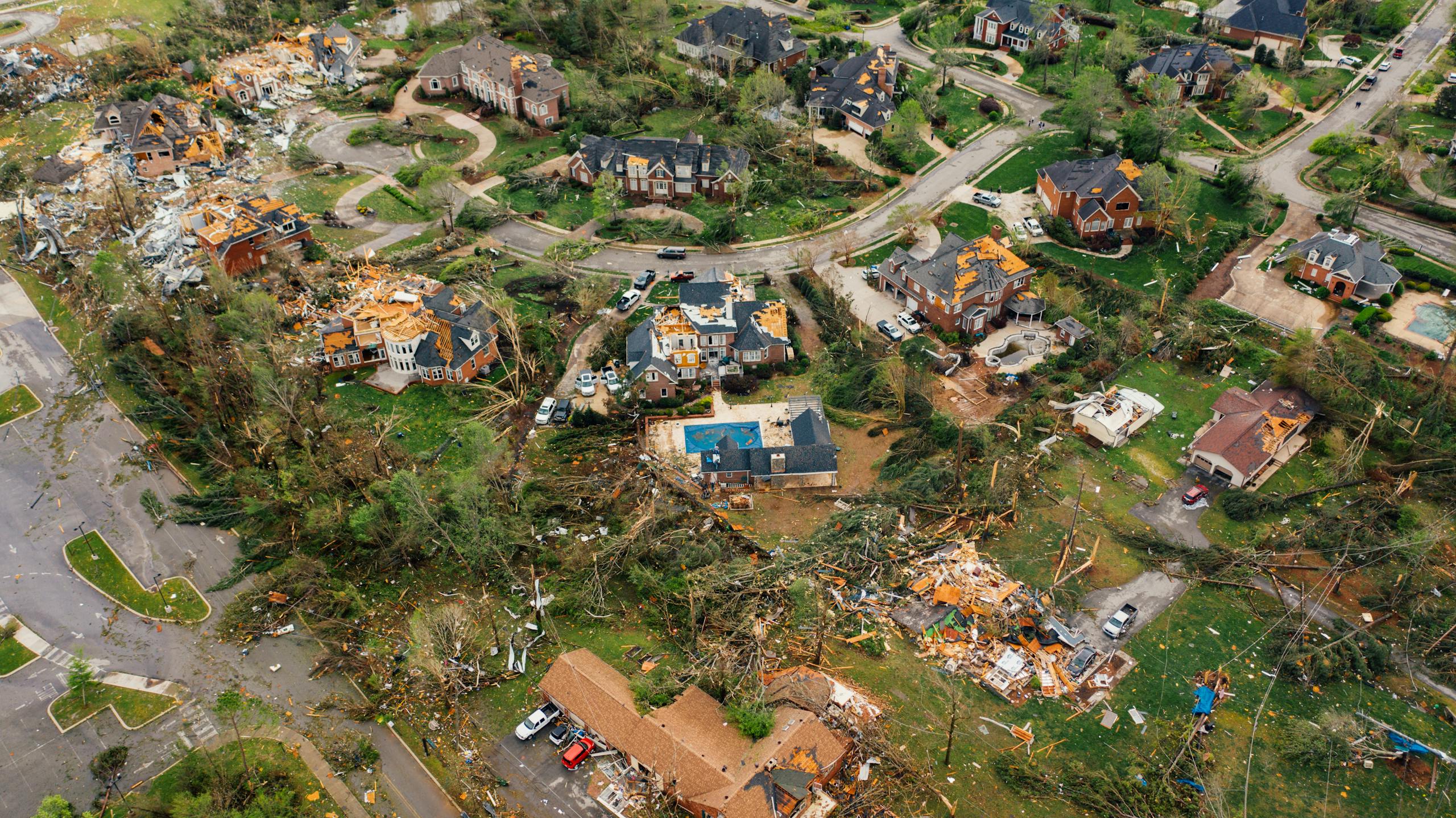 Dramatic view of village houses damaged by thunderstorm